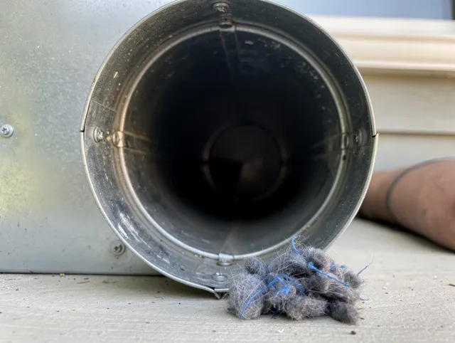 Marina del Rey Dryer Vent Cleaning technician using specialized equipment to clear severe dryer vent blockage in Marina del Rey